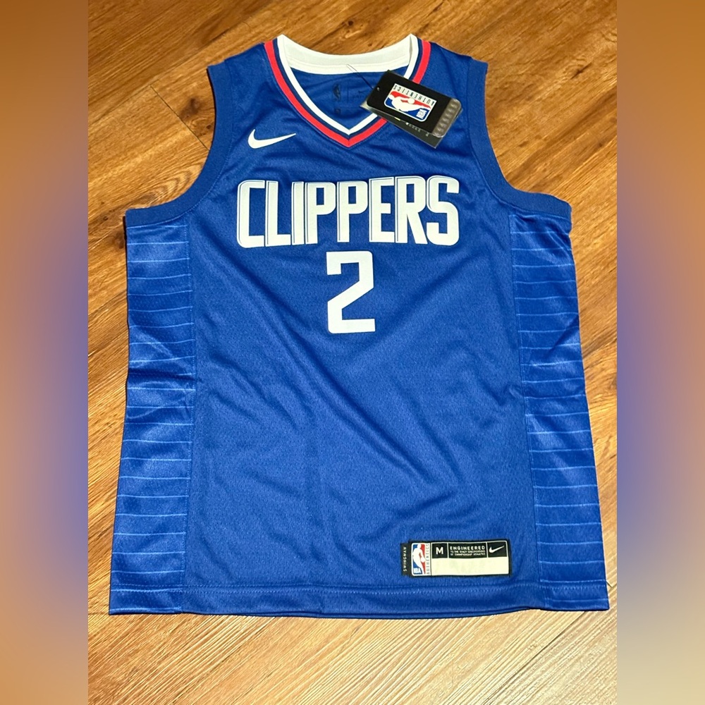 New with tags Kawhi Leonard Nike LA Clippers Jersey in Blue / White. Youth M